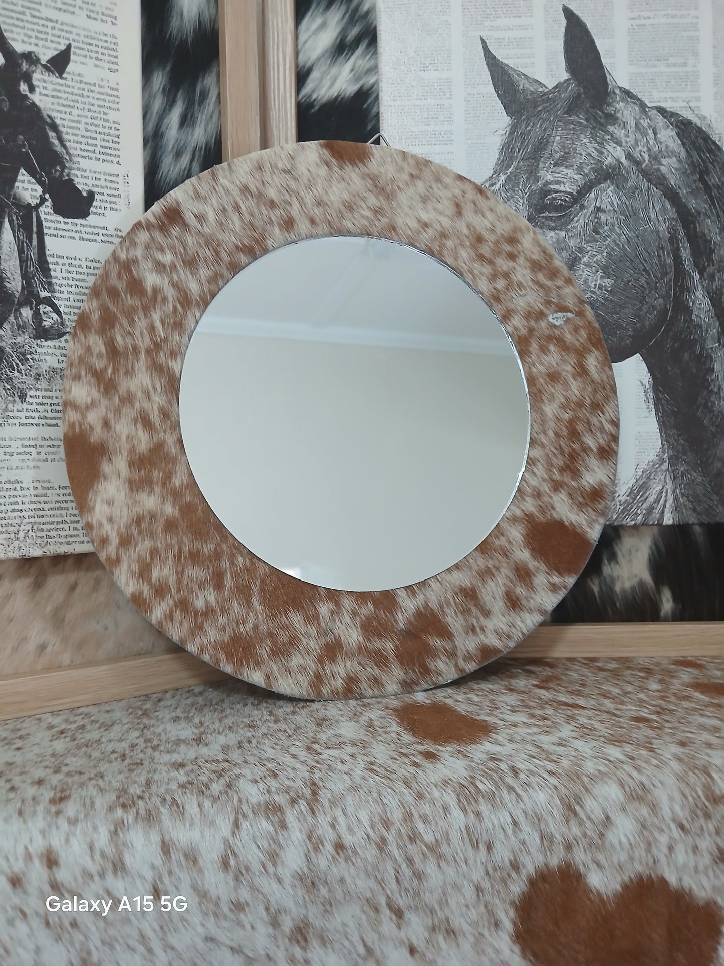Cowhide wall mirror