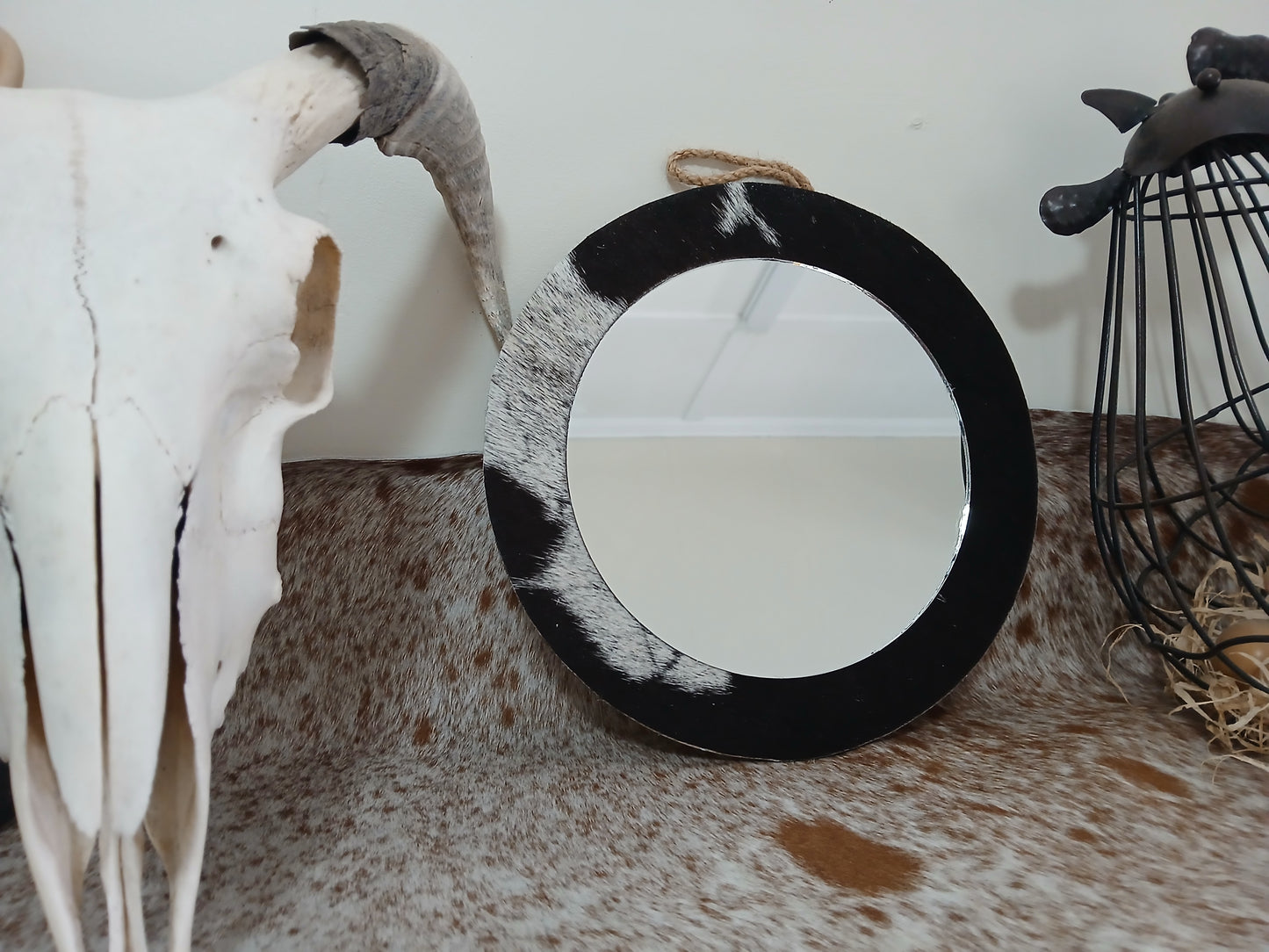Cowhide wall mirror