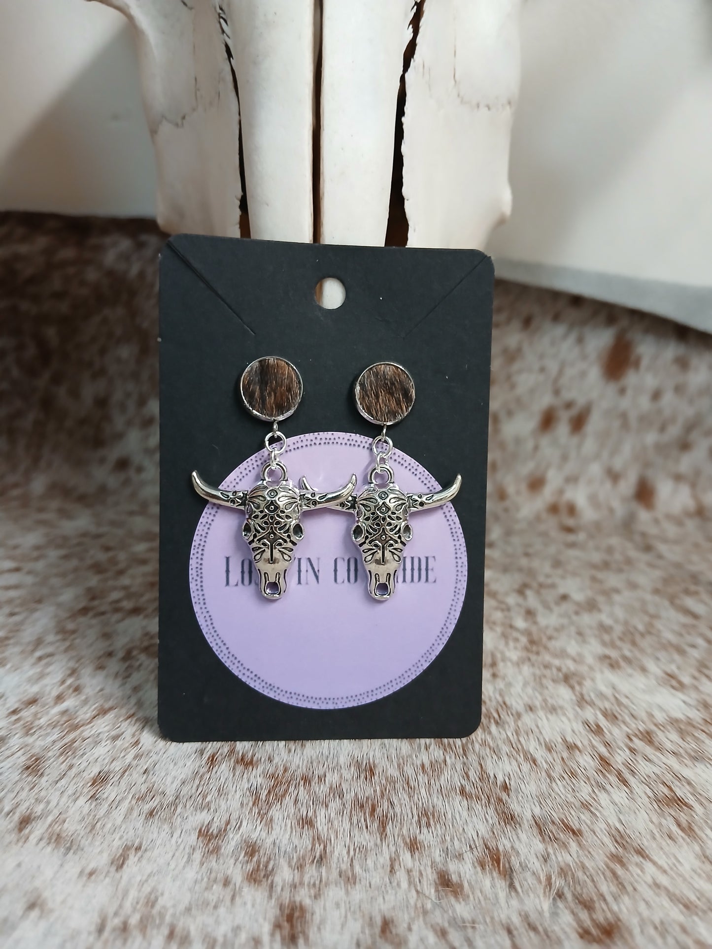 Stud dangle earrings